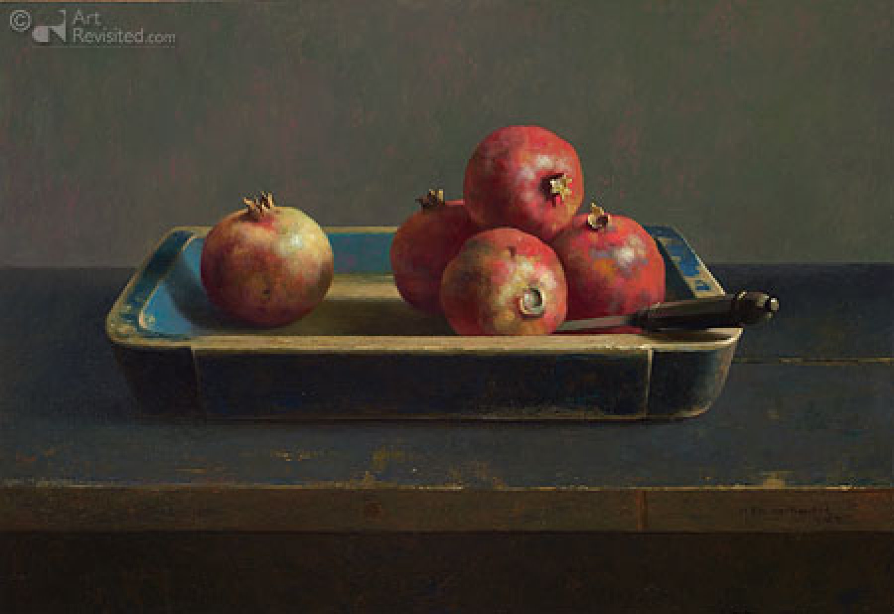 Granaatappels in blauwe bak